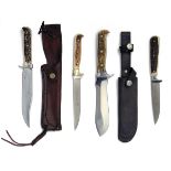 PUMA, SOLINGEN A COLLECTION OF FOUR SHEATH-KNIVES, SOME BOXED, including a boxed model '