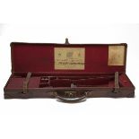 HOLLAND & HOLLAND A LEATHER SINGLE GUNCASE, fitted for 30in. barrels, the interior lined with red