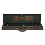 WESTLEY RICHARDS A LEATHER SINGLE GUNCASE, fitted for 30in. barrels, the interior lined with green