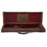 JOHN DICKSON & SON A BRASS-CORNERED OAK AND LEATHER SINGLE HAMMERGUN CASE, fitted for 30in. barrels,