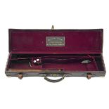 WILLIAM EVANS A BRASS-CORNERED LEATHER SINGLE GUNCASE, fitted for 30in. barrels, the interior