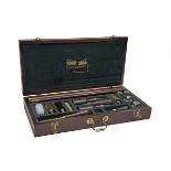 WILLIAM POWELL A CASED 12-BORE 'DELUXE' CLEANING KIT, fitted partitioned tray with separate