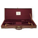A BRASS-CORNERED TAN LEATHER DOUBLE GUNCASE, fitted for 28in. barrels (could adapt to 30in.), the