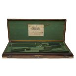 BOSS, LONDON A MOST UNUSUAL BRASS-CORNERED OAK GUN-CASE FOR A PAIR OF 12-BORE PERCUSSION GUNS,