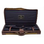AGUIRRE Y ARANZABAL A LEATHER DOUBLE GUNCASE, fitted for 28 1/2in. barrels, the interior lined