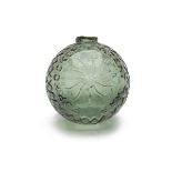AN EXCEPTIONALLY RARE PALE GREEN GLASS TARGET BALL FOR HOCKEY'S PATENT AUTOMATIC TRAP, circa 1885,