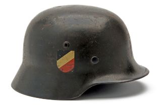 A DOUBLE-DECALLED M35 GERMAN HELMET TO THE LUFTWAFFE, bearing an ink stamp inside with the makers