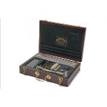 PENDLETON ROYAL AN UNUSED LUXURY 'WINDSOR' 12-BORE GUN CLEANING KIT, with a green lined tray
