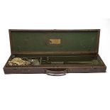 A WESTLEY RICHARDS-STYLE LEATHER-BOUND OAK CASE, fitted for 30in. barrels, the lid with added