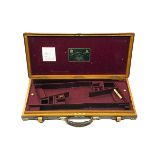 JAMES PURDEY & SONS A BRASS-CORNERED LEATHER DOUBLE GUNCASE, fitted for 28in. barrels, the