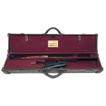E.J. CHURCHILL A LIGHTWEIGHT LEATHER DOUBLE MOTORCASE, fitted for 28in. barrels (would adapt to