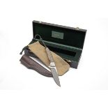 HOLLAND & HOLLAND AN UNUSED CASED HUNTING KNIFE, with 4in. blade signed Holland & Holland and