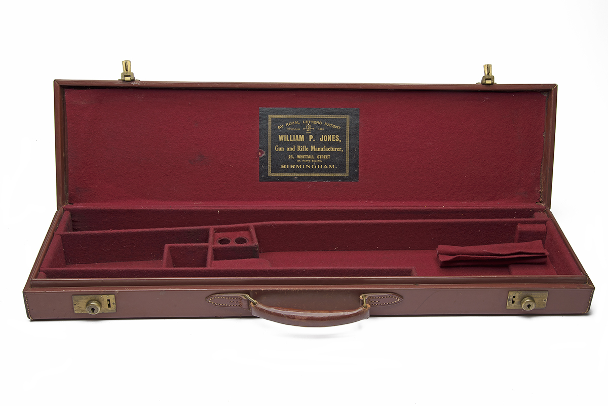 A TAN LEATHER SINGLE GUNCASE, fitted for 27in. barrels, the interior lined with red baize, a William