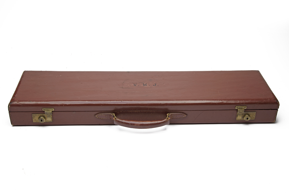 A TAN LEATHER SINGLE GUNCASE, fitted for 27in. barrels, the interior lined with red baize, a William - Image 2 of 2