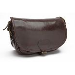 E.J. CHURCHILL A LEATHER SUEDE-LINED CARTRIDGE BAG, with canvas and leather shoulder strap, the