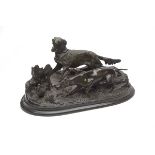 A COPY OF PIERRE-JULES MENE'S FINE BRONZE SCULPTURE OF TWO HUNTING DOGS AND A PHEASANT, one of
