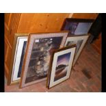 A collection of framed and glazed prints and pictu