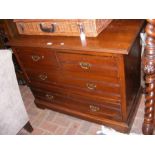 An antique chest of two short and two long drawers