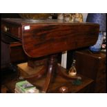 A 19th century mahogany Pembroke table on splayed