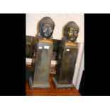 A pair of decorative buddha ornaments - 60cms high