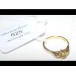 An 18ct diamond and yellow sapphire? ring - size N