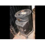 A cast metal conservatory/patio gas heater
