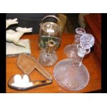 A biscuit barrel, decanters, pipe etc