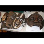 A Pende mask together with three other old carved