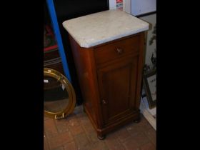 A marble top pot cupboard