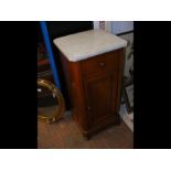 A marble top pot cupboard