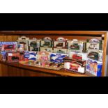 A selection of boxed die cast vehicles, including