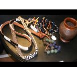 Selection of old African necklaces, together with