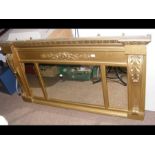 A gilt triptych over mantel mirror - width 153cms