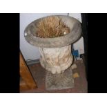 A large classical shaped garden urn - 98cm high