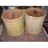 Two large terracotta circular plant pots