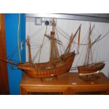 A model of The Santa Maria together with a model o