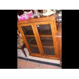 A mahogany glazed bookcase - width 90cm