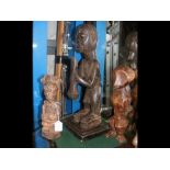 A carved African tribal figure - 26cm high - with