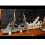 A cast metal and marble Art Deco figural group of