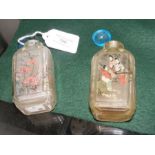 A pair of old 9cm high Oriental snuff bottles with
