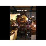 An Edwardian sideboard with mirrored back and disp