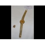 A lady's 18ct gold Omega De Ville wrist watch with