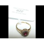An 18ct diamond and ruby cluster ring - size H (ap