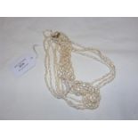A ladies multi-strand pearl necklace