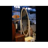 A French style Cheval mirror with cream and gilt d