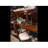 A Victorian oval dining table on reeded legs - len