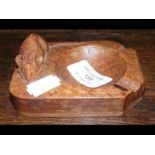 A small carved wooden Mouseman ashtray