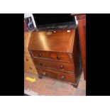 A 19th century mahogany bureau with drawers below