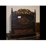 A decorative Oriental table top cabinet with drawe