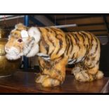A Steiff Tiger Cub with button to left ear and gla